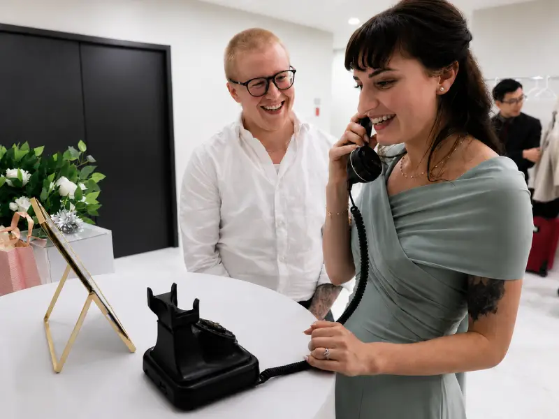 Wedding guest using the vintage audio guestbook phone