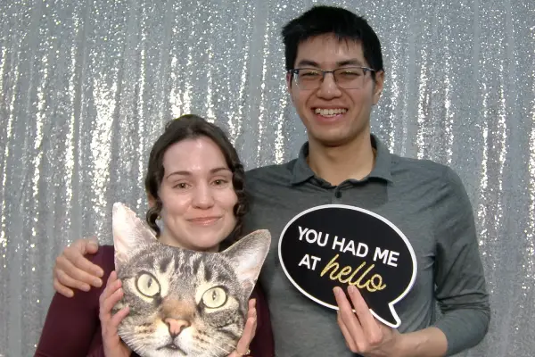 Couple enjoying a photobooth moment