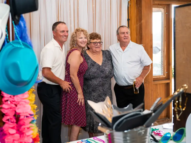 Couple creating a playful photo booth memory