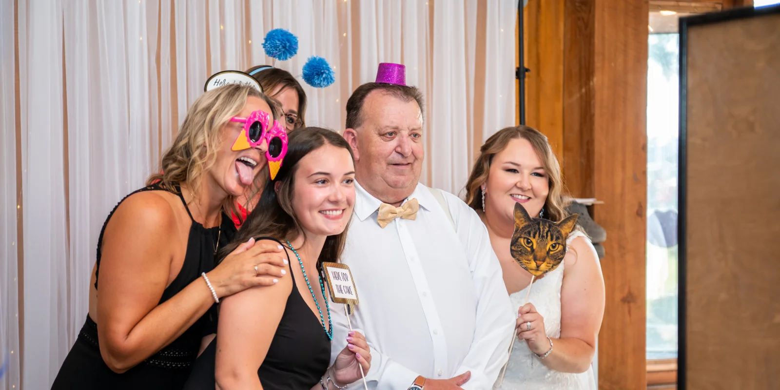 Bride and family enjoying a photobooth