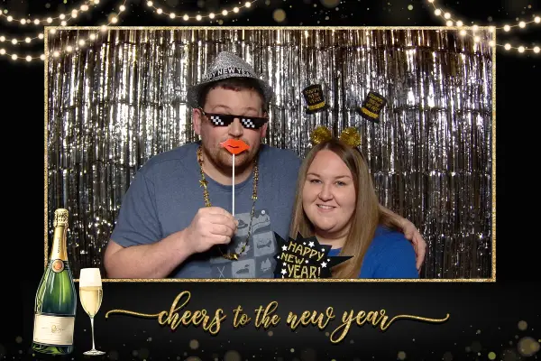 Guests using props at New Years Eve